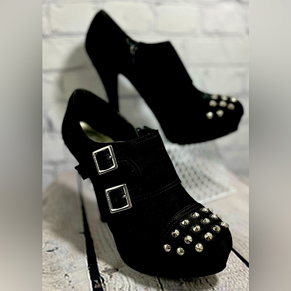 G By GUESS booties, with sliver studs, buckles and side zip, size 8.5.
